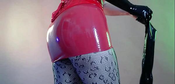 latex fetish model wear rubber clothing for pleasure and kinky role play bdsm games